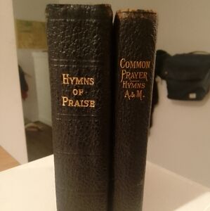 Two antique leather bound hymnals